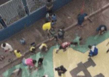Com tinta e crian&ccedil;ada no asfalto, emo&ccedil;&atilde;o da Copa toma rua de Campo Grande