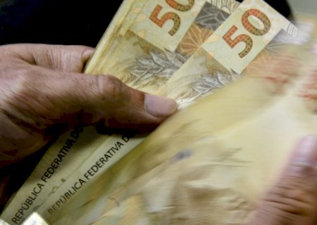 Caixa começa a pagar Bolsa Família de maio